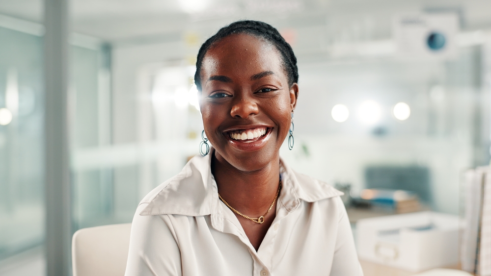Smiling woman in a bright dental office