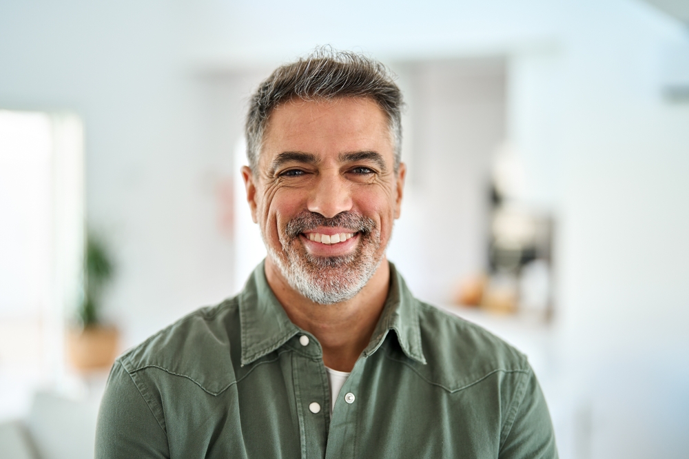 Smiling man with a healthy smile