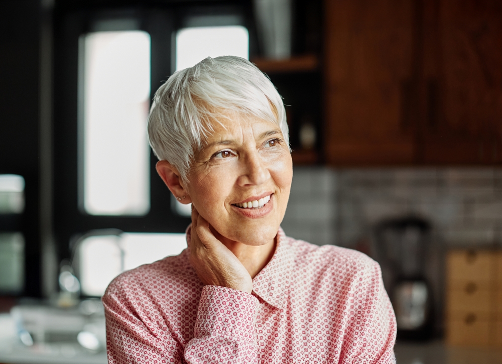 Smiling older woman at home